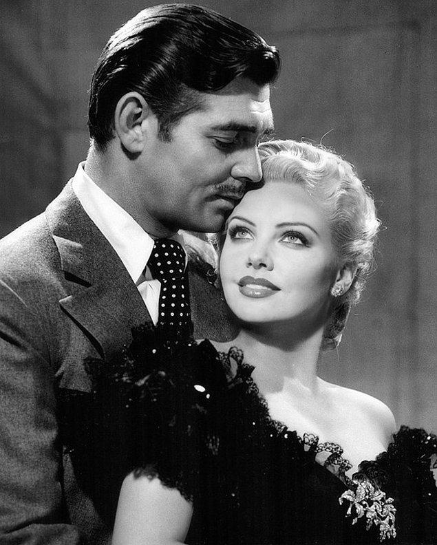 2. Clark Gable and Charlize Theron: Oh how happy Charlize looks in Clark’s arms…