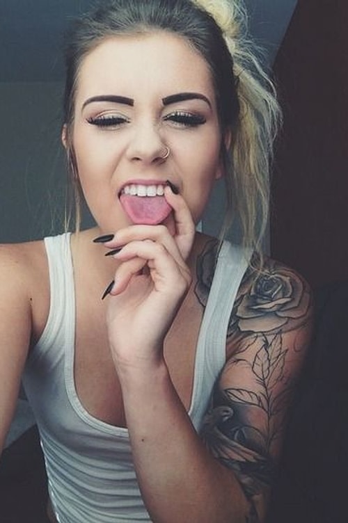 When girls are taking photos, their tongue gets bigger and cannot fit into their mouth because of the consistent pressure area.