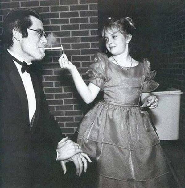 2. A young Drew Barrymore lighting Stephen King's Cigarette