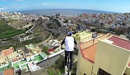 BMX райдер проделывает сумасшедшие трюки на крышах