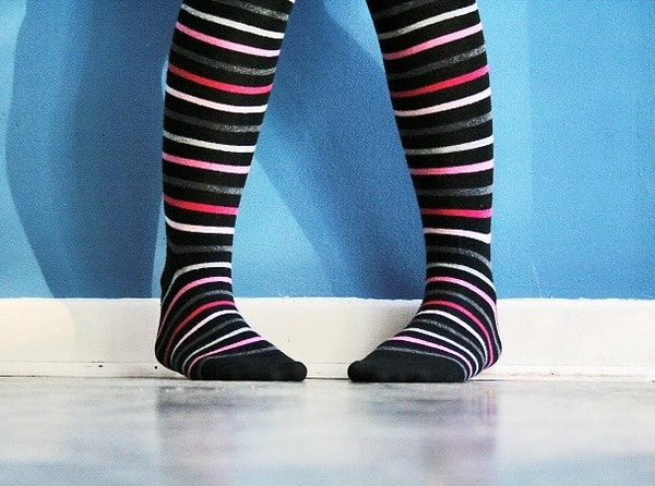 23. Наибольшее количество носков, надетых на одну ногу в течение минуты