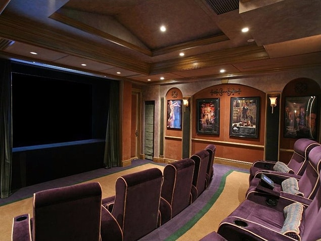 12. The home theater can accommodate 20 guests in plush seats.