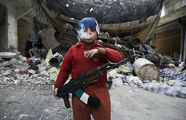 18. Lost Innocence: This 8-year old Syrian insurgent doesn't look like a child anymore.