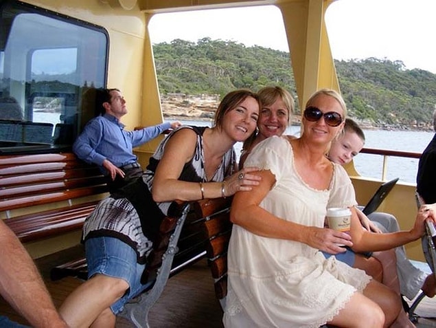 21. It seems like the man with the blue shirt is on top of that lady.