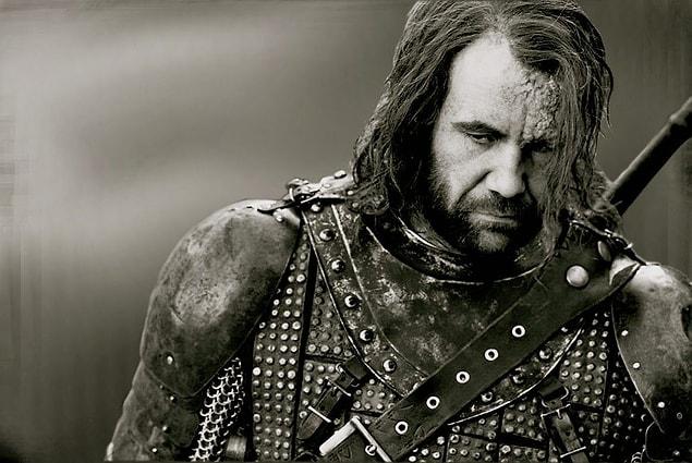 17. In the books, The Hound's face is described as follows : "The left side of his face is a ruin with no ear but only a hole. There is a twisted mass of scar around his good left eye. Slick black flesh is pocked with craters and deep cracks that ooze red and wet. His eyes are grey. On his jaw, bone shows.".