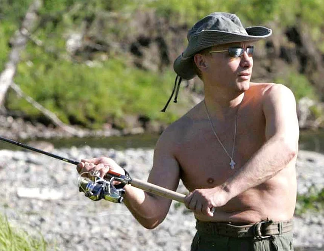 Putin also likes to relax by fishing...