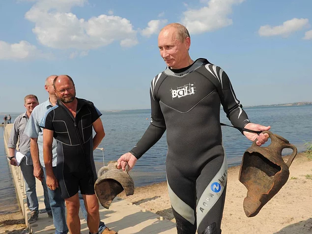 Putin is also a man of science. Here he SCUBA dives at an archaeological site.