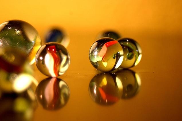 5. How are glass marbles made?