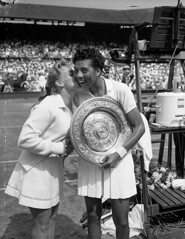 7. 1957- Althea Gibson becomes the first African-American to play and win in the women's singles at Wimbledon.