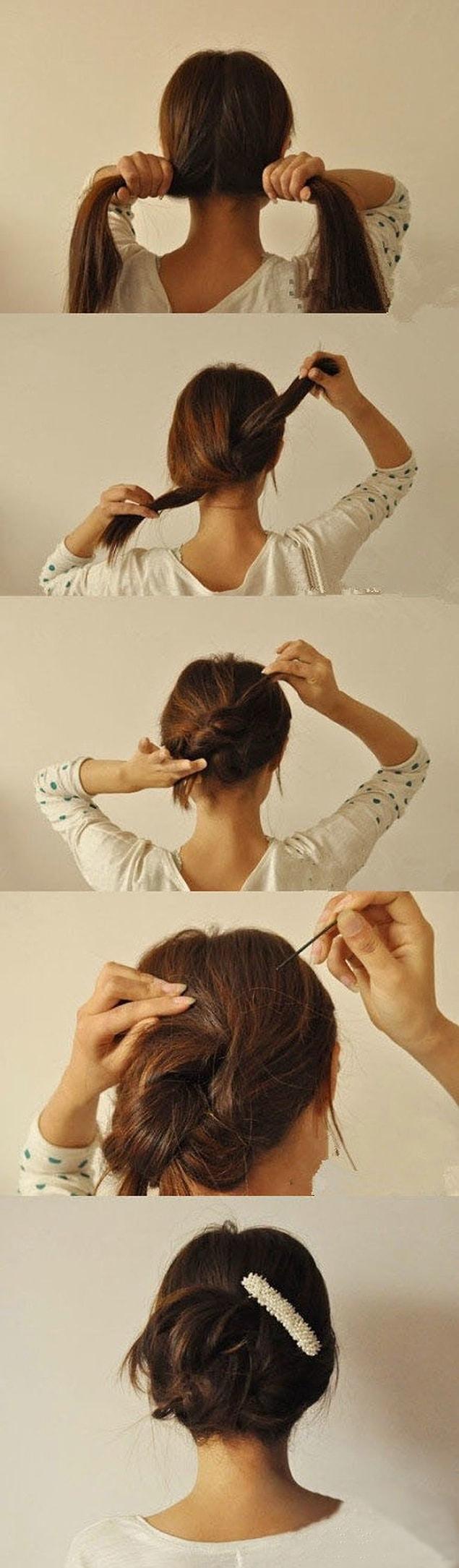 1. Split your hair in the middle, knot, twist and secure it with bobby pins.