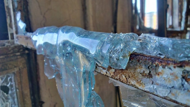 7. The remains of melted glass from a building that was on fire