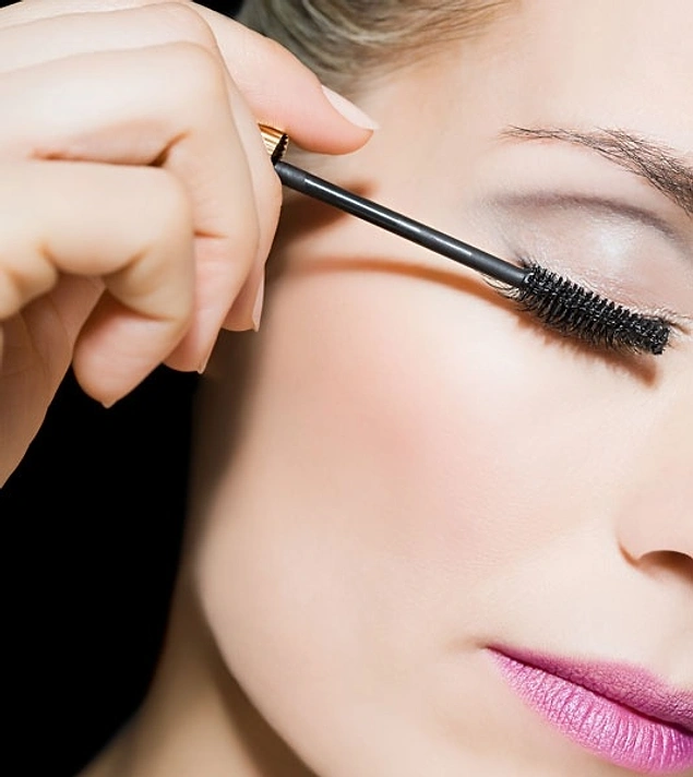 Apply mascara as much as you like. Then, use a finished wand to separate the uneven piles.