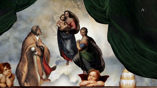 When you have a close look at the clouds behind Madonna...