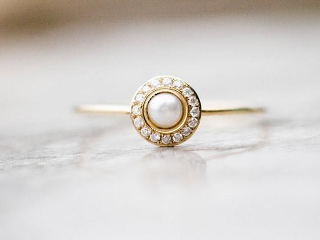14. A pearl ring that looks like a family ring passed on for generations.