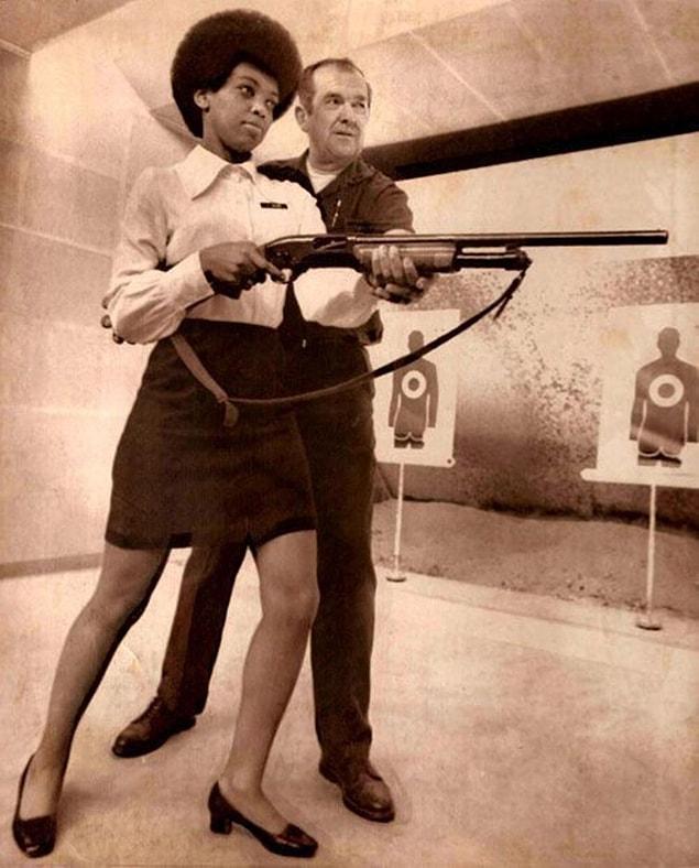 1. Saundra Brown, the first black woman on the Oakland police force, gets instructions on how to shoot a shotgun, 1970.