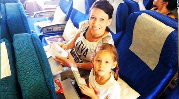4. Dave Hally karısının ve 4 yaşındaki kızının bu son fotoğrafını onları rüyalarındaki tatile götürmesi gerekirken düşen MH17 Malezya Havayolları uçağı kalkmadan anlar önce çekti.