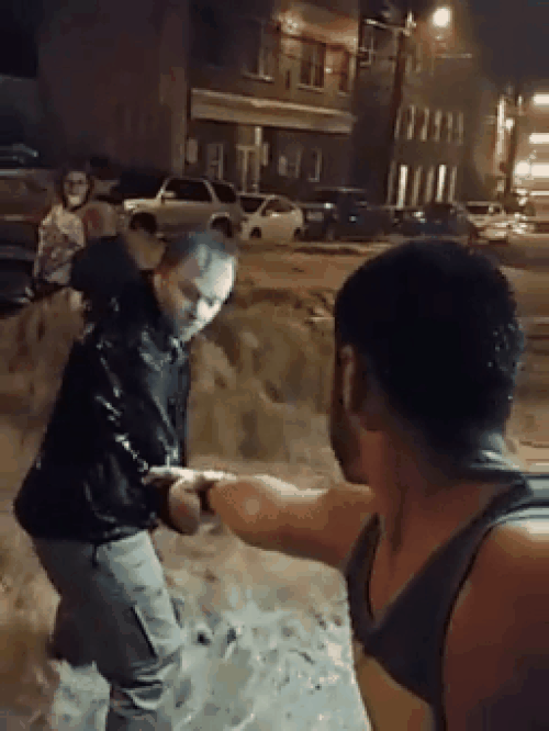 These people who didn't hesitate for a second to save that woman from the flood.