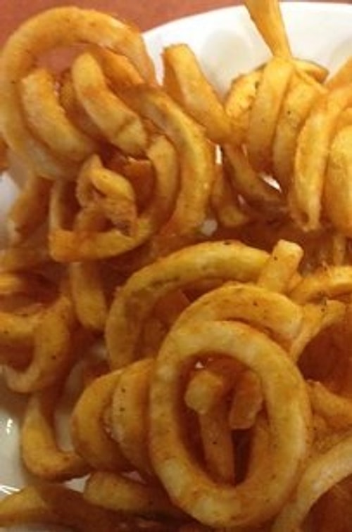 All forms of school potato, like cubes, smilies, and curly fries.