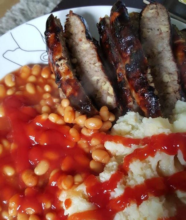 23. Covering baked beans in ketchup.