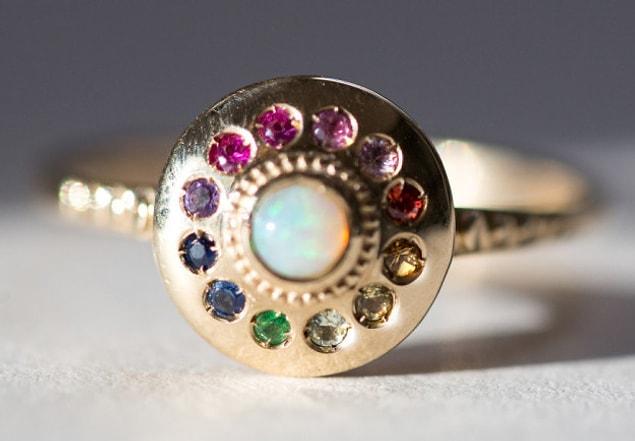 27. A rainbow UFO-like ring that’s made up of too many gemstones to list.
