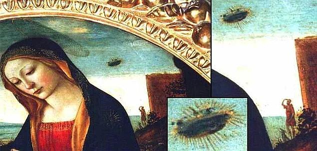 When you look closer at the painting, there seems to be an object very similar to a UFO in the sky!