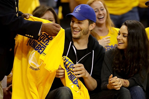 11. Мила Кунис и Эштон Кутчер