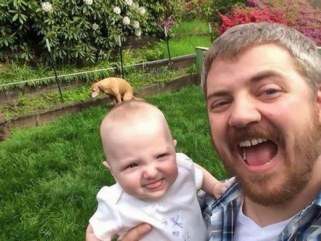 It was the perfect selfie until the dog decided to poo poo on the baby