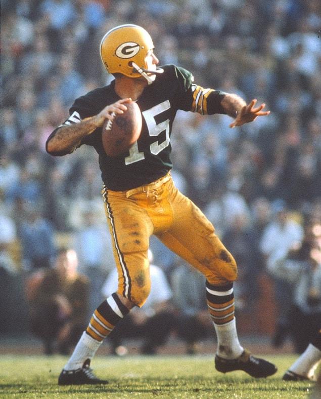 17. Quarterback Bart Starr of the Green Bay Packers drops back to pass against the Kansas City Chiefs.