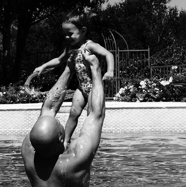 29. Vin Diesel playing in the pool with his daughter.