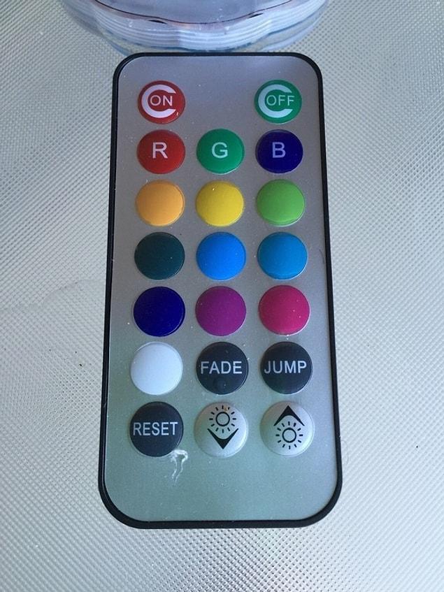 13. This remote that has a red “on” button and a green “off” button...