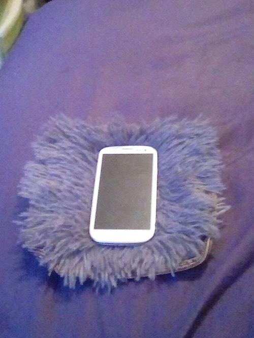 "This is a rug I ordered online. Really soft but really really small."