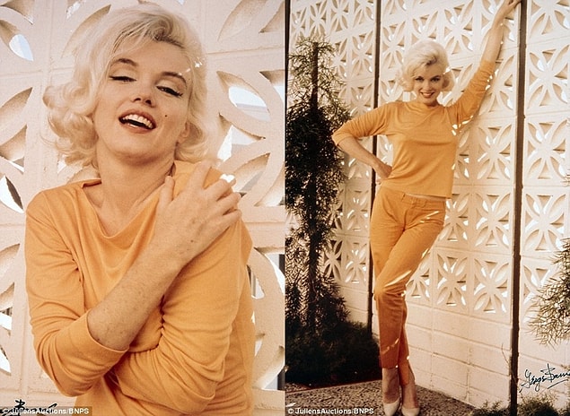 George Barris captured the Los Angeles-born star posing against a white wall in an orange top and trousers.