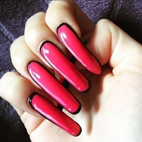 Yup. That's THREE years without cutting her nails. Here's what they looked like when she started growing them out: