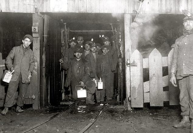 7. At the close of the day, men and boys stand inside a crowded cage to be transported up the mining shaft at the Pennsylvania Coal Company in South Pittston, Pennsylvania, in 1908.