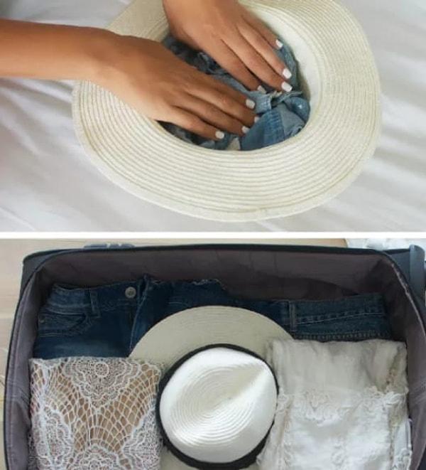 11. Valizdeki şapkanızın içini doldurarak hem yerinizi tutumlu kullanabilir, hem de şapkanın formunu koruyabilirsiniz.