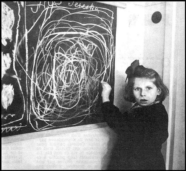 17. A girl who grew up in a concentration camp draws a picture of “home” while living in a "residence for disturbed children," 1948.