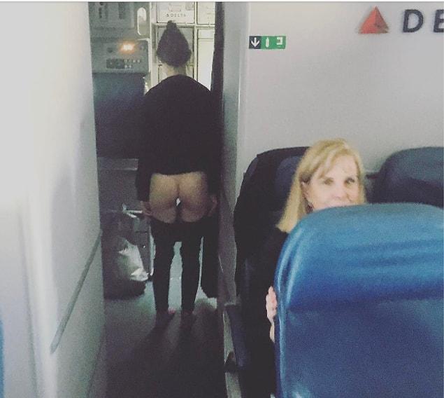 18. Butt salute on the plane.