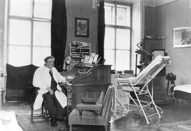 44. Eduard Bloch, the Jewish physician of the Hitler family, working at his office.  | 1938