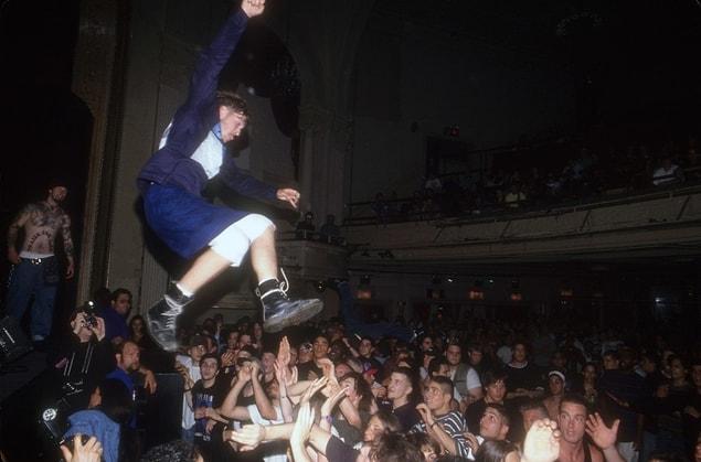 23. 1993, young man jumping into the crowd.