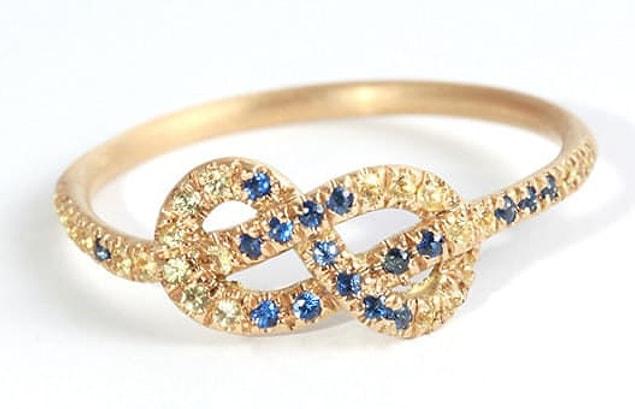 #20 The infinity symbol embellished with yellow and blue sapphires. <3