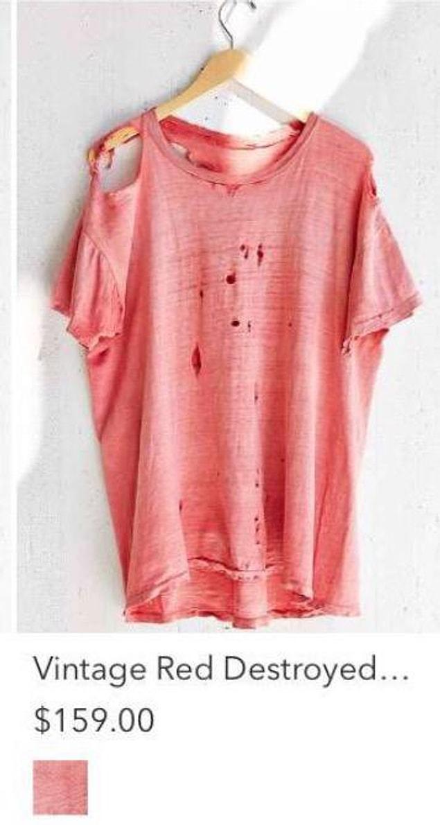 12. A perfectly nice top getting the "distressed" treatment.