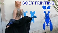 This Sexy Woman Makes Art With Her Body On The Walls Of The City