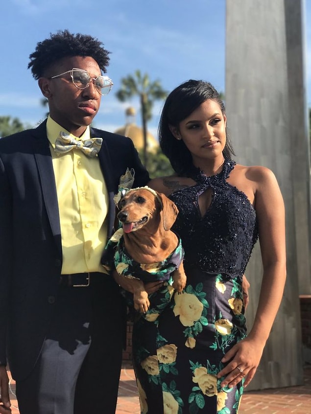 When preparations for the prom were done, Brenda took photos with her date and her pup.