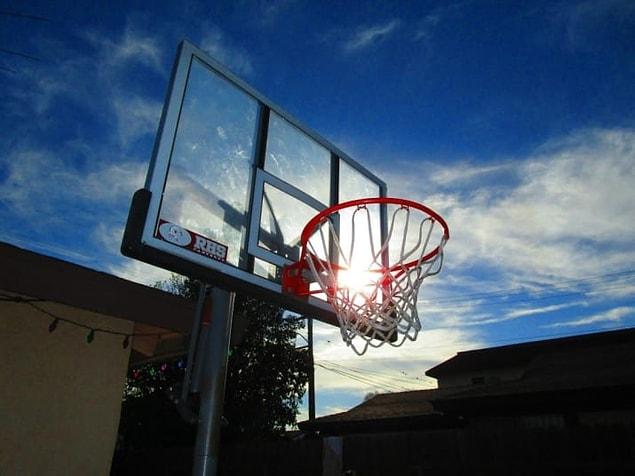 Nadine sees the beauty in even an otherwise ordinary trio of sun, sky and a basketball hoop.