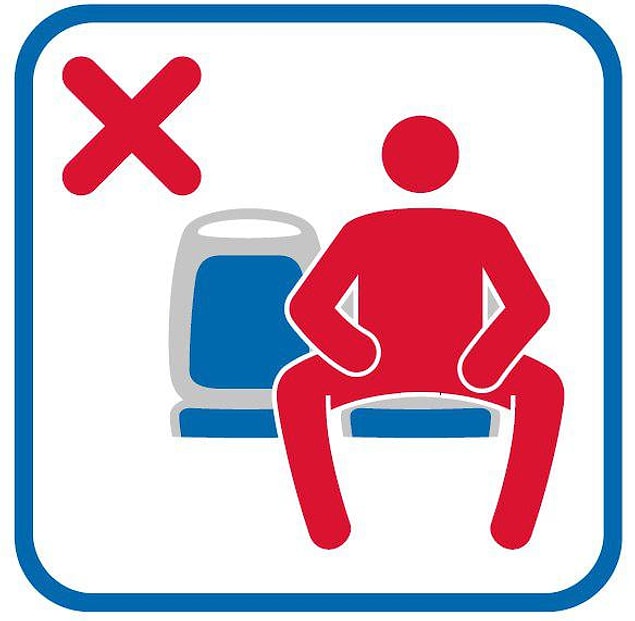 Tabelada metroda bacaklarını açarak oturan erkek resminin yanında çarpı işareti bulunuyor.