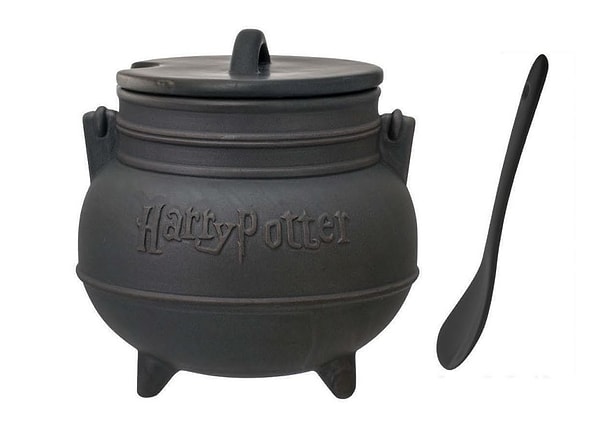 1. Черный керамический горшок с ложкой