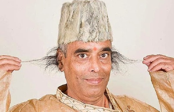 11. Самые длинные волосы из ушей