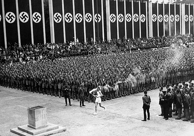 2. Olympic flame reaching Berlin and atmosphere, 1936