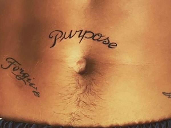 9. У какой знаменитости может быть такая татуировка?