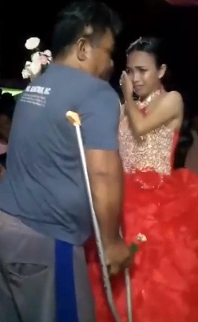 The disabled father struggled to move his feet with crutches to dance with his daughter at her 18th birthday party.